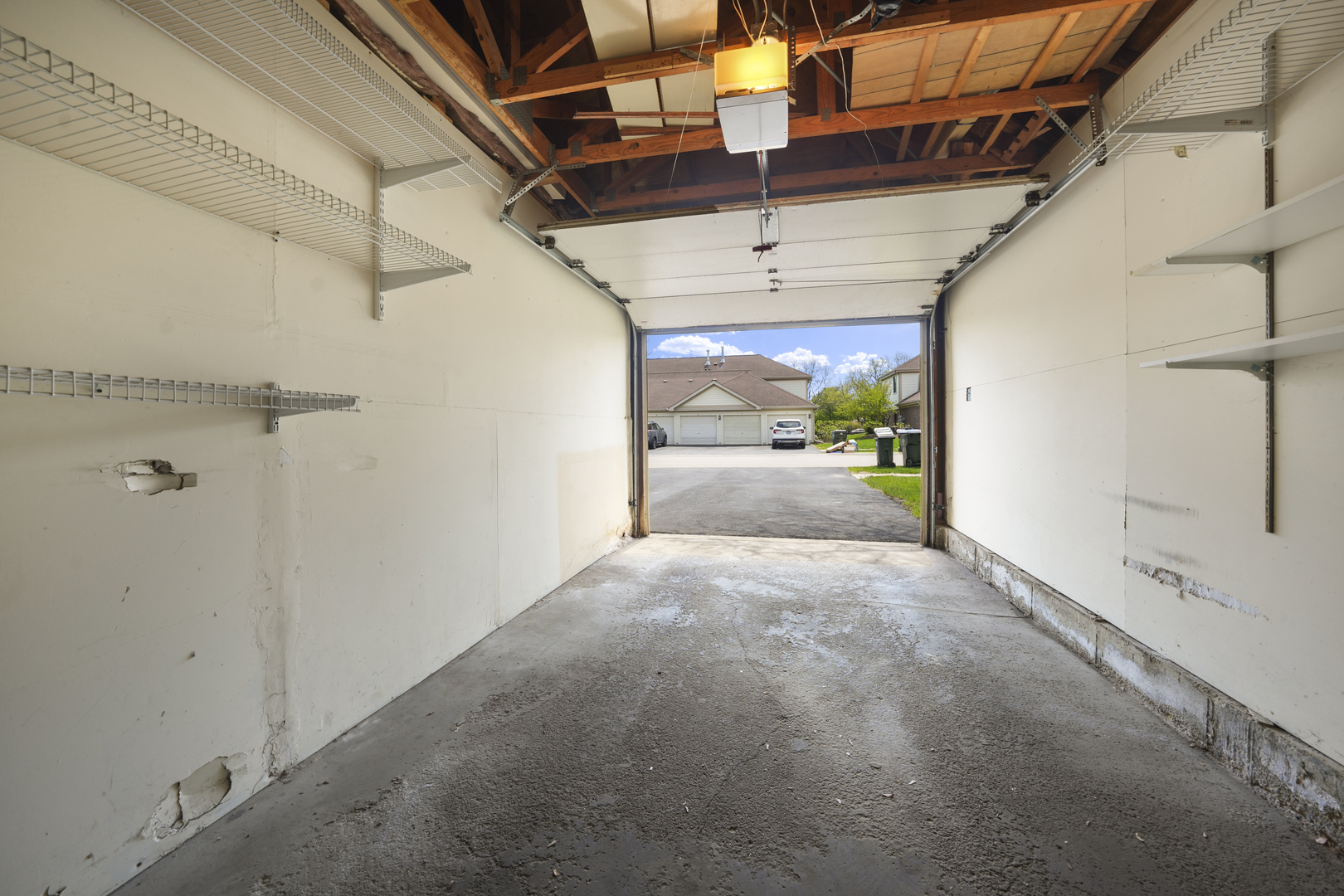 924 Coach Road, Unit 1 Palatine, IL 60074 - Photo 20 of 23 a view of a hallway with wooden walls