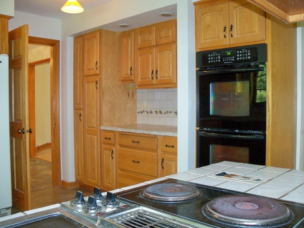 842 North River Road Greene, ME 04236 - Photo 9 of 24 KITCHEN WITH JENN-AIRE RANGE AND...