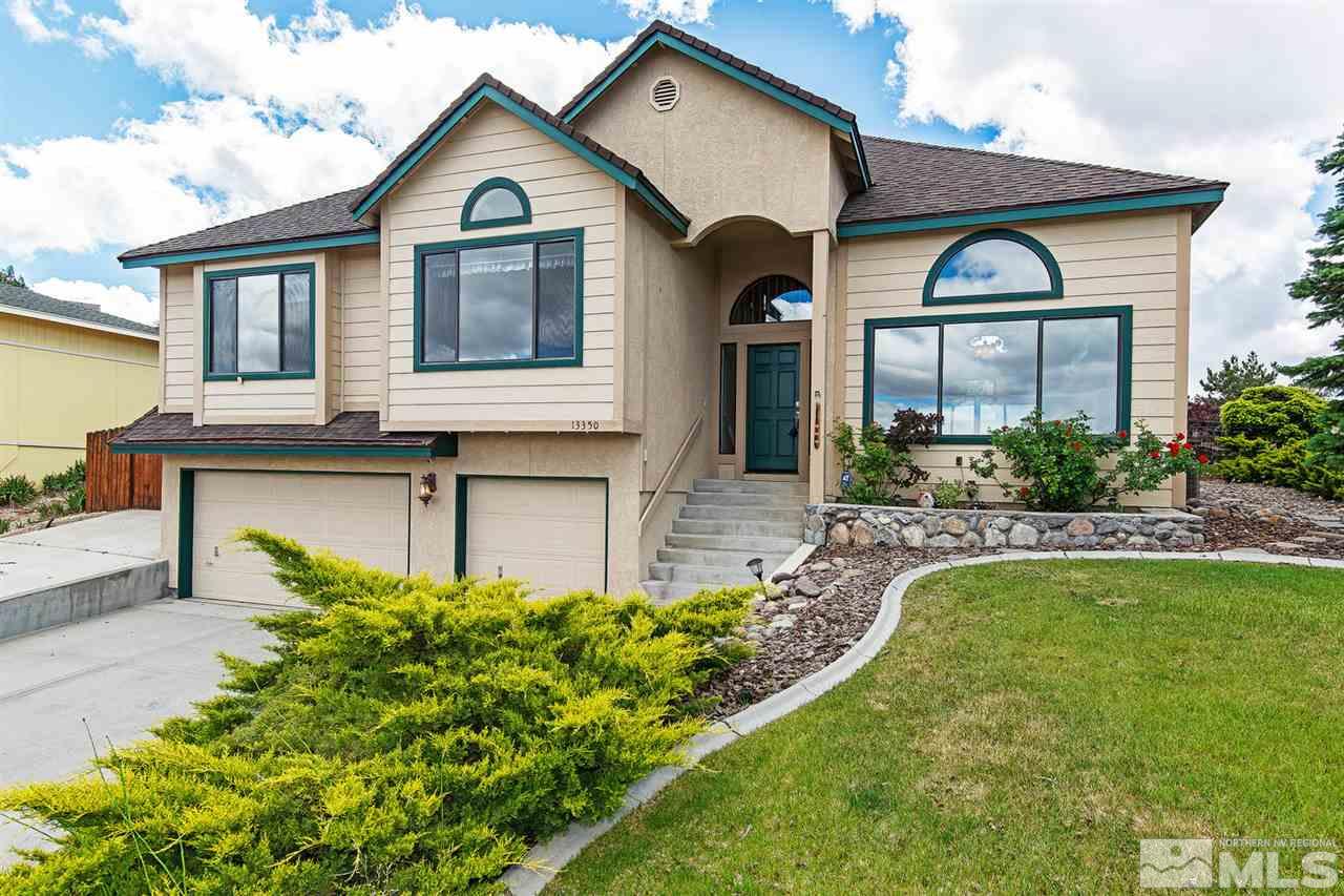 13350 Rim Rock Drive Reno, NV 89521 - Photo 1 of 1 a front view of a house with garden