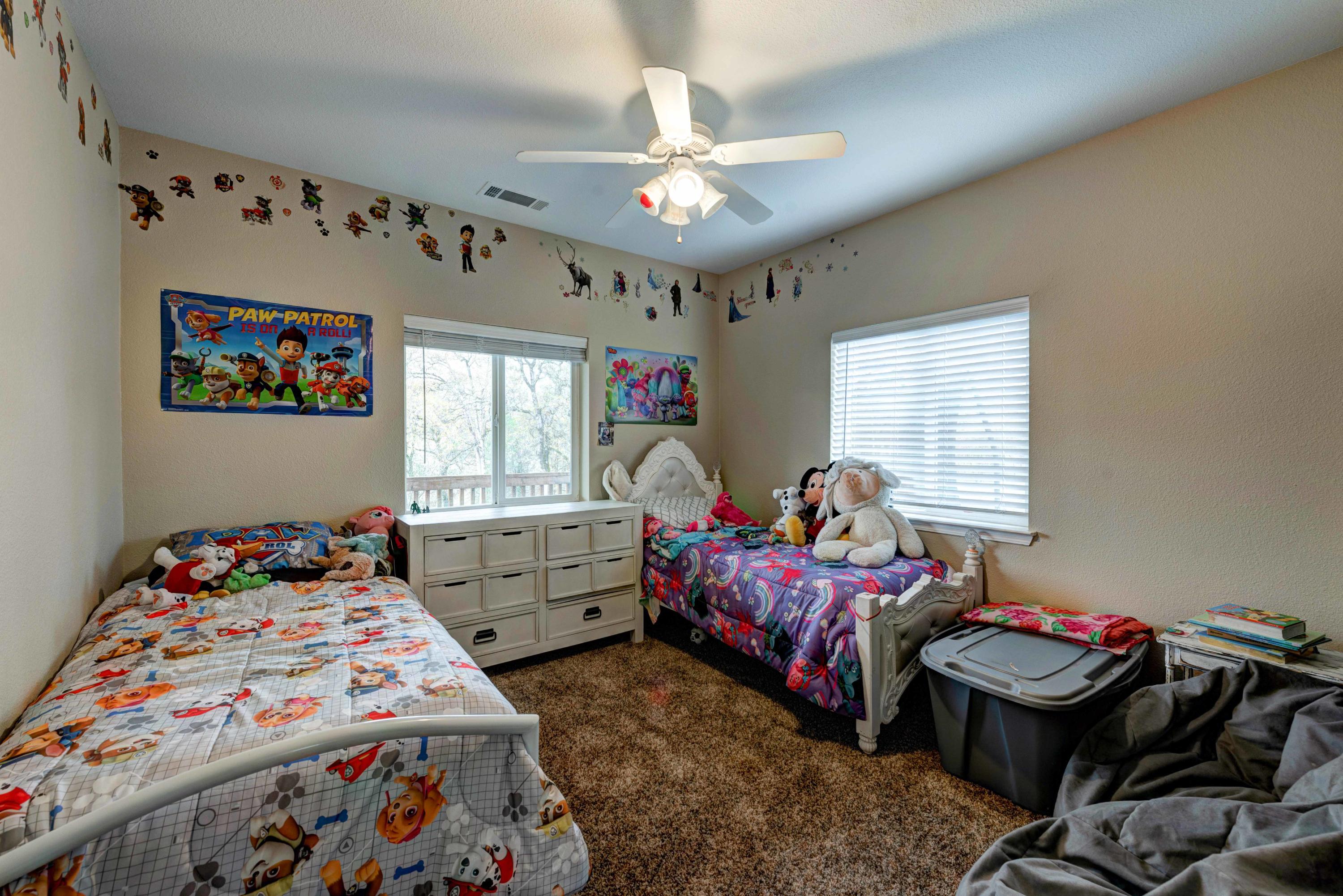 13711 Gas Point Road Igo, CA 96047 - Photo 14 of 29 a bedroom with bed and a large window