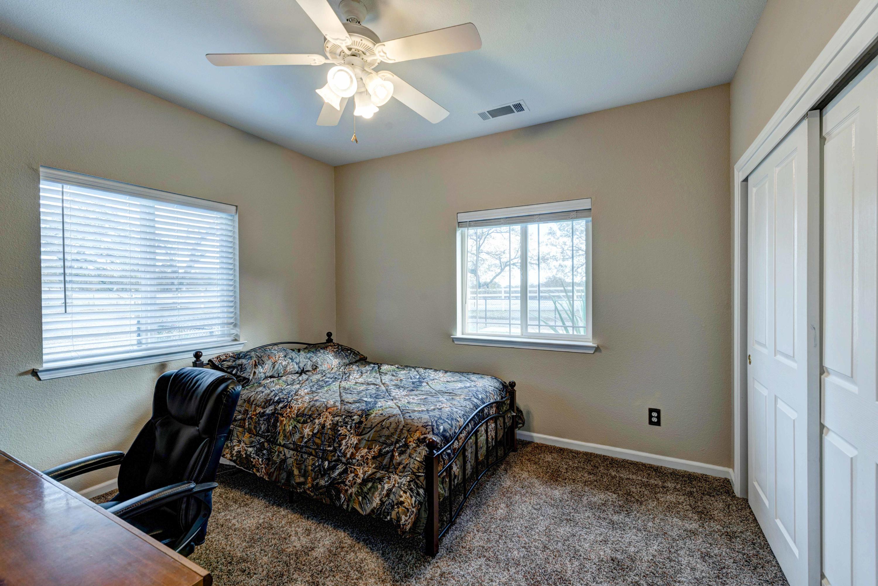 13711 Gas Point Road Igo, CA 96047 - Photo 15 of 29 a bedroom with a bed and a window