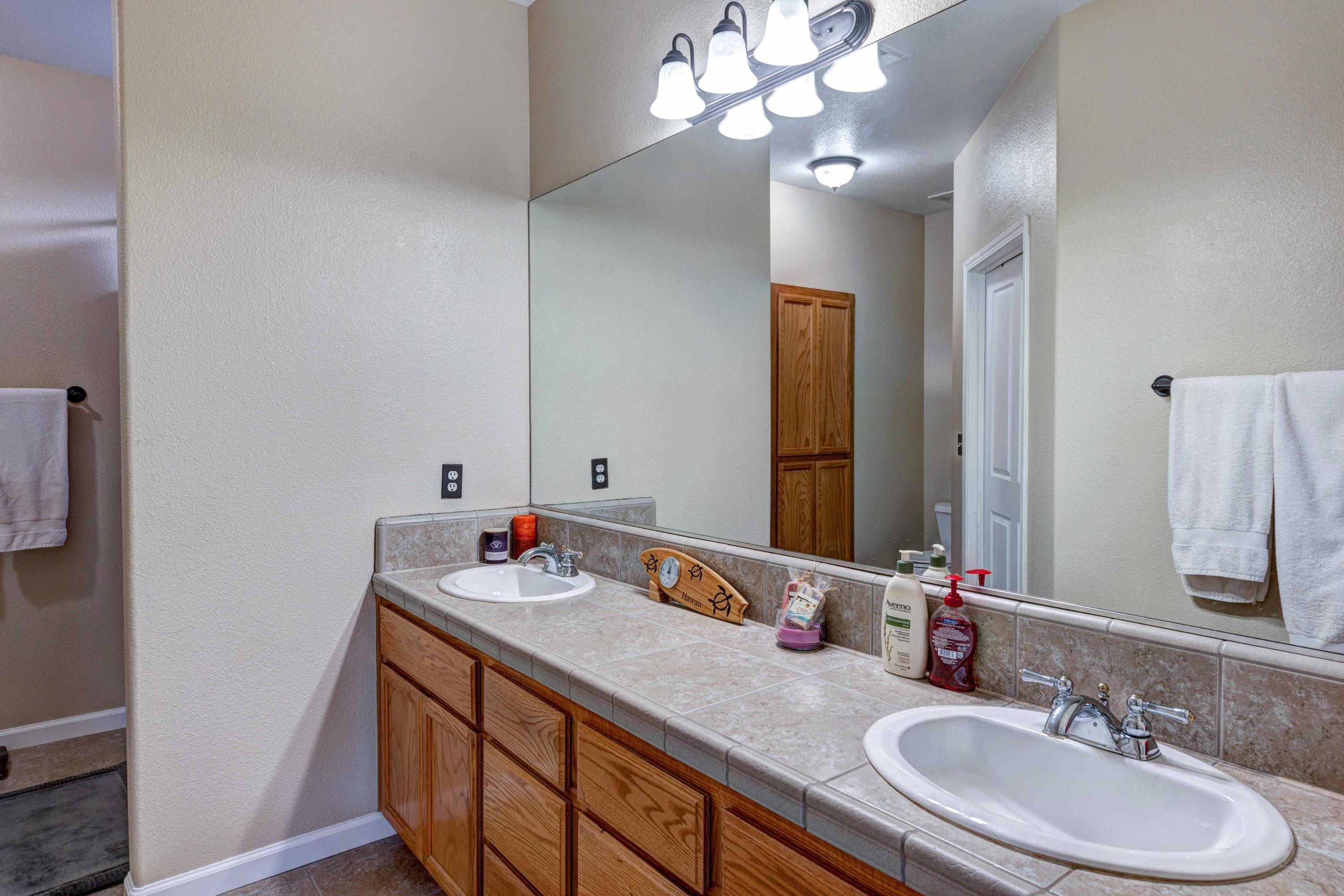 13711 Gas Point Road Igo, CA 96047 - Photo 18 of 29 a bathroom with a sink vanity and a mirror