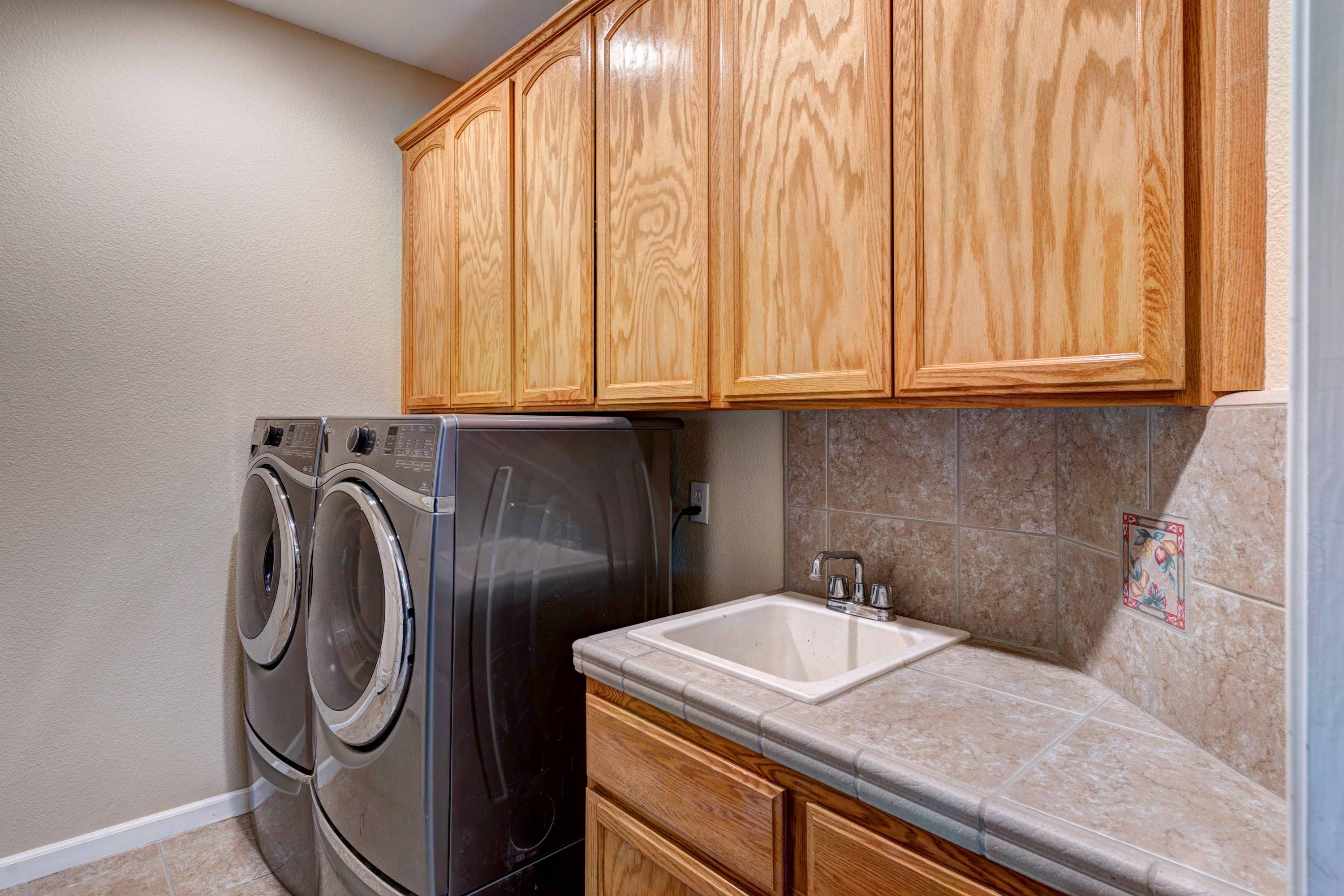 13711 Gas Point Road Igo, CA 96047 - Photo 19 of 29 a utility room with dryer and washer