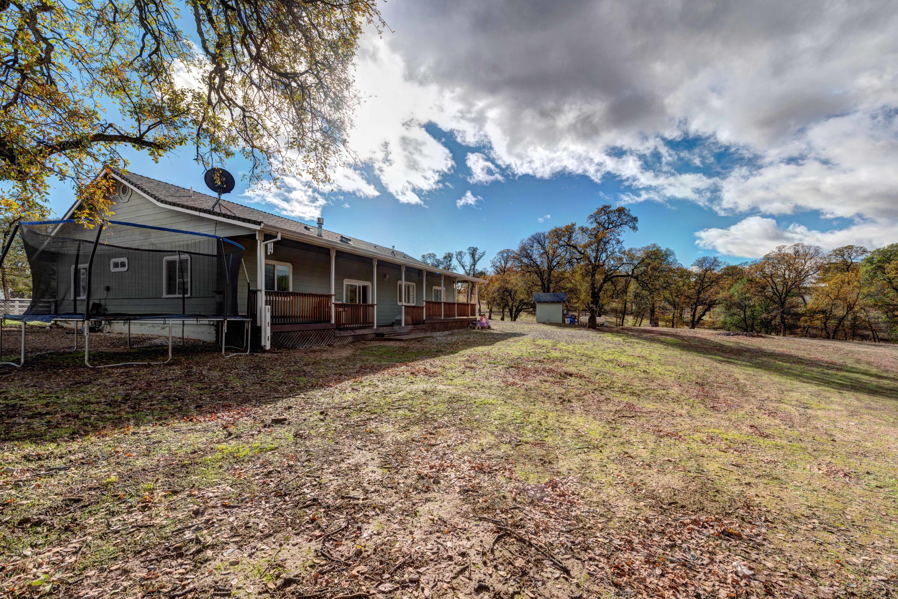 13711 Gas Point Road Igo, CA 96047 - Photo 22 of 29 a view of a house with a yard