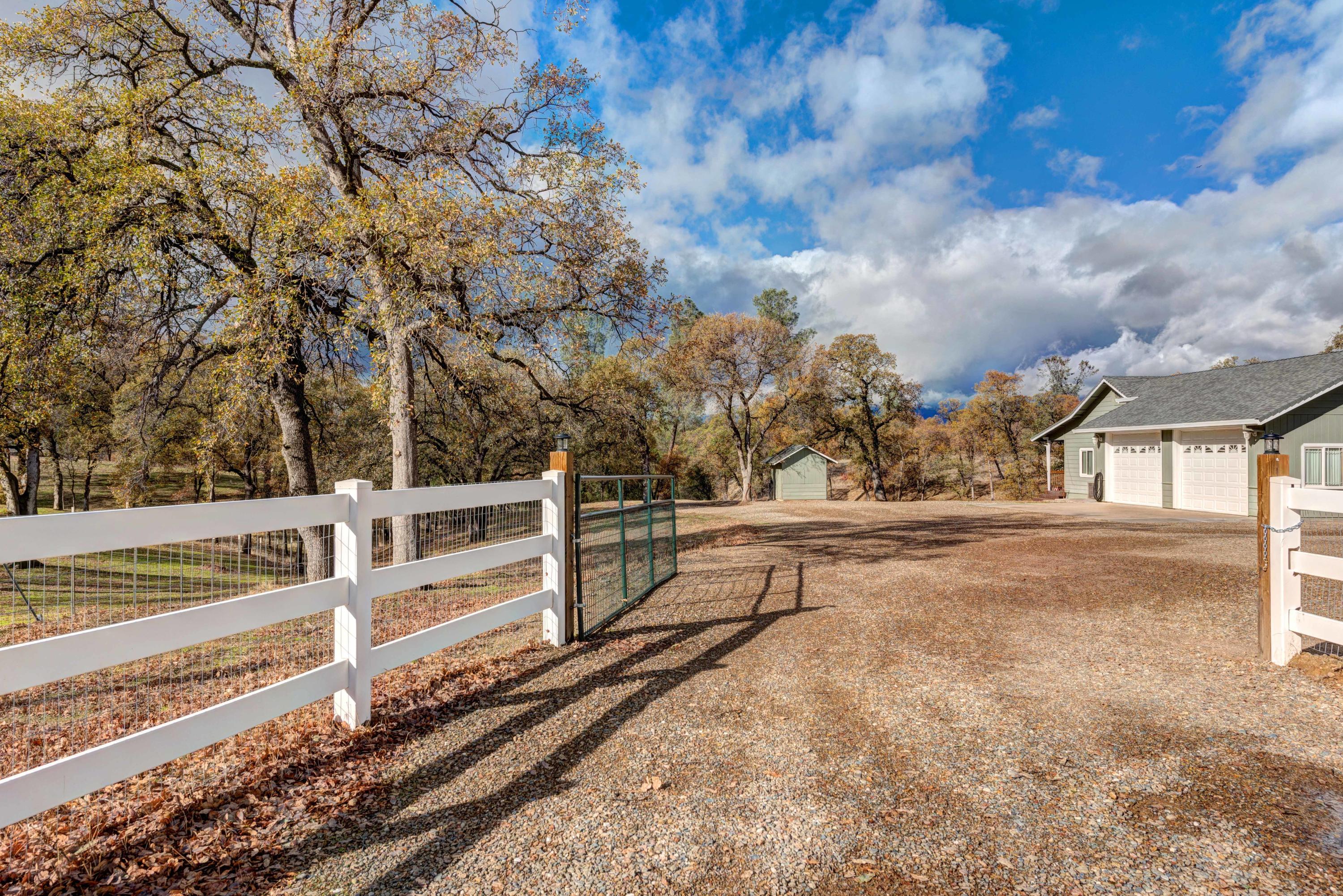 13711 Gas Point Road Igo, CA 96047 - Photo 26 of 29 a view of a yard with wooden fence