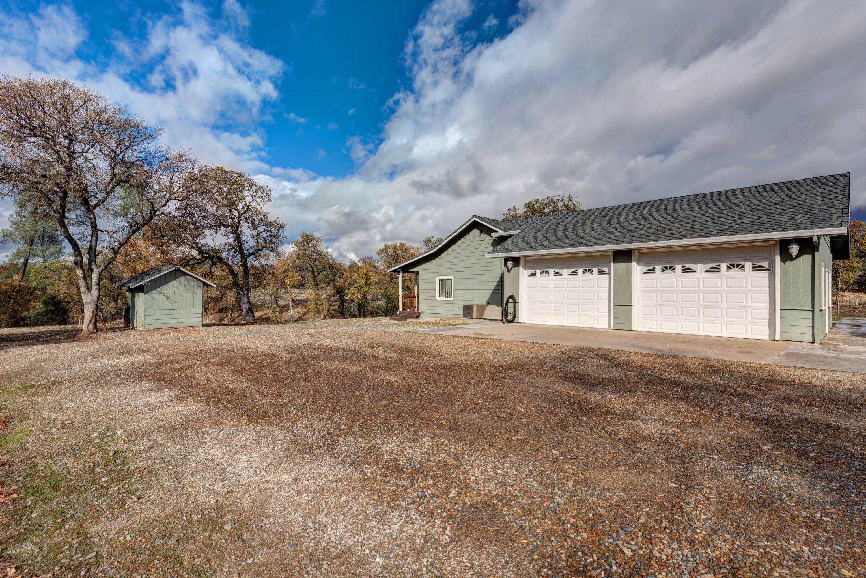 13711 Gas Point Road Igo, CA 96047 - Photo 27 of 29 a view of large house with a street