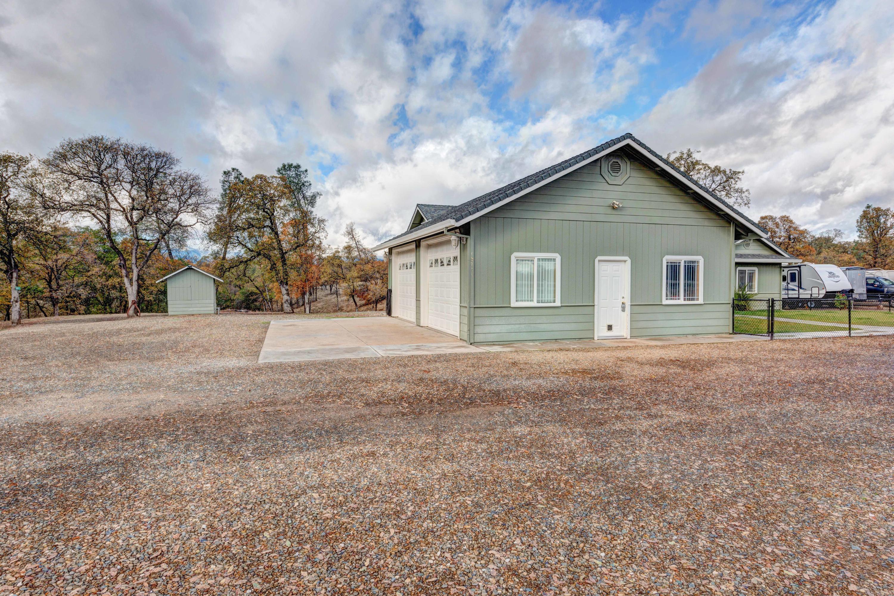 13711 Gas Point Road Igo, CA 96047 - Photo 28 of 29 a front view of a house with a yard