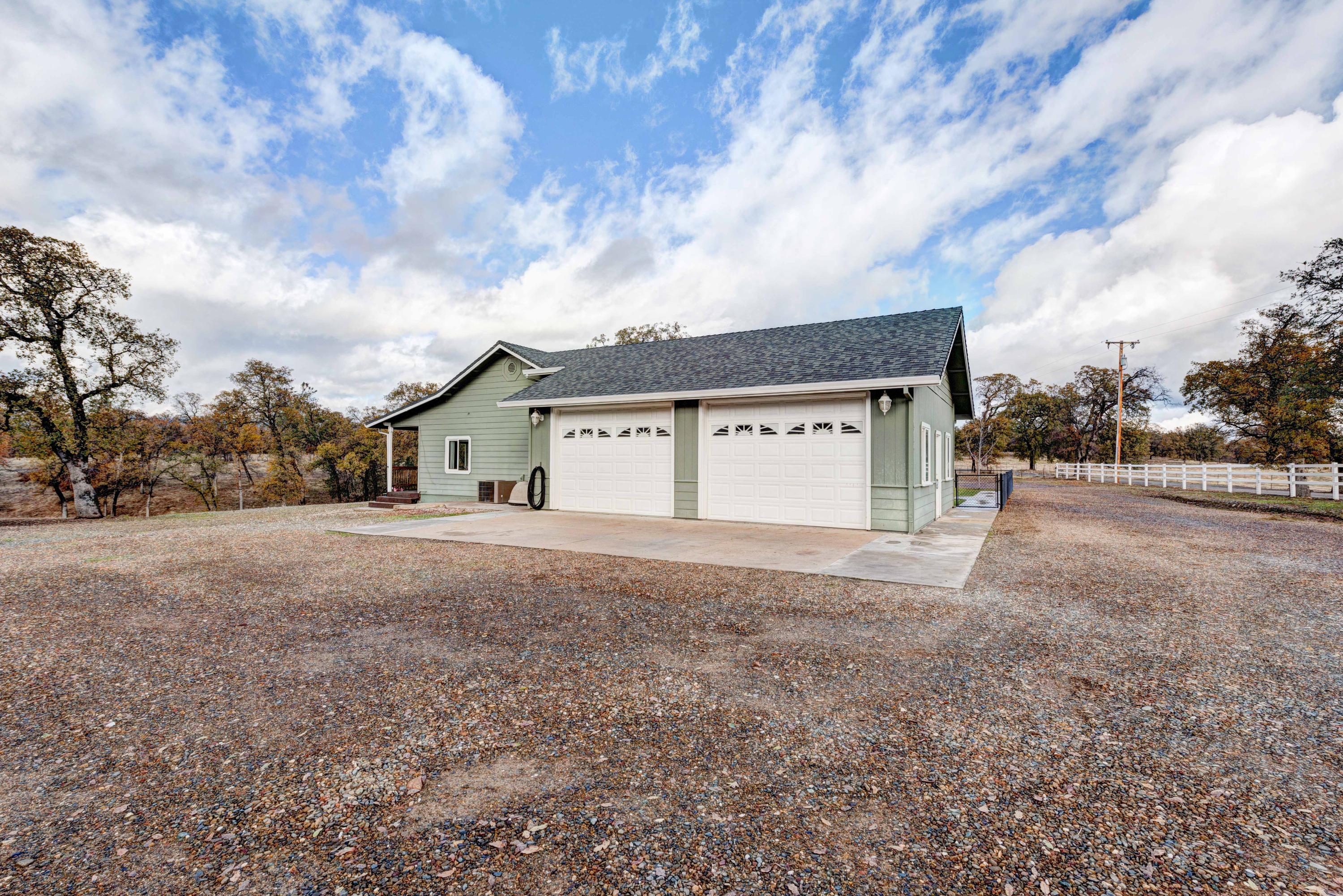 13711 Gas Point Road Igo, CA 96047 - Photo 29 of 29 a view of open space with house and trees in the background