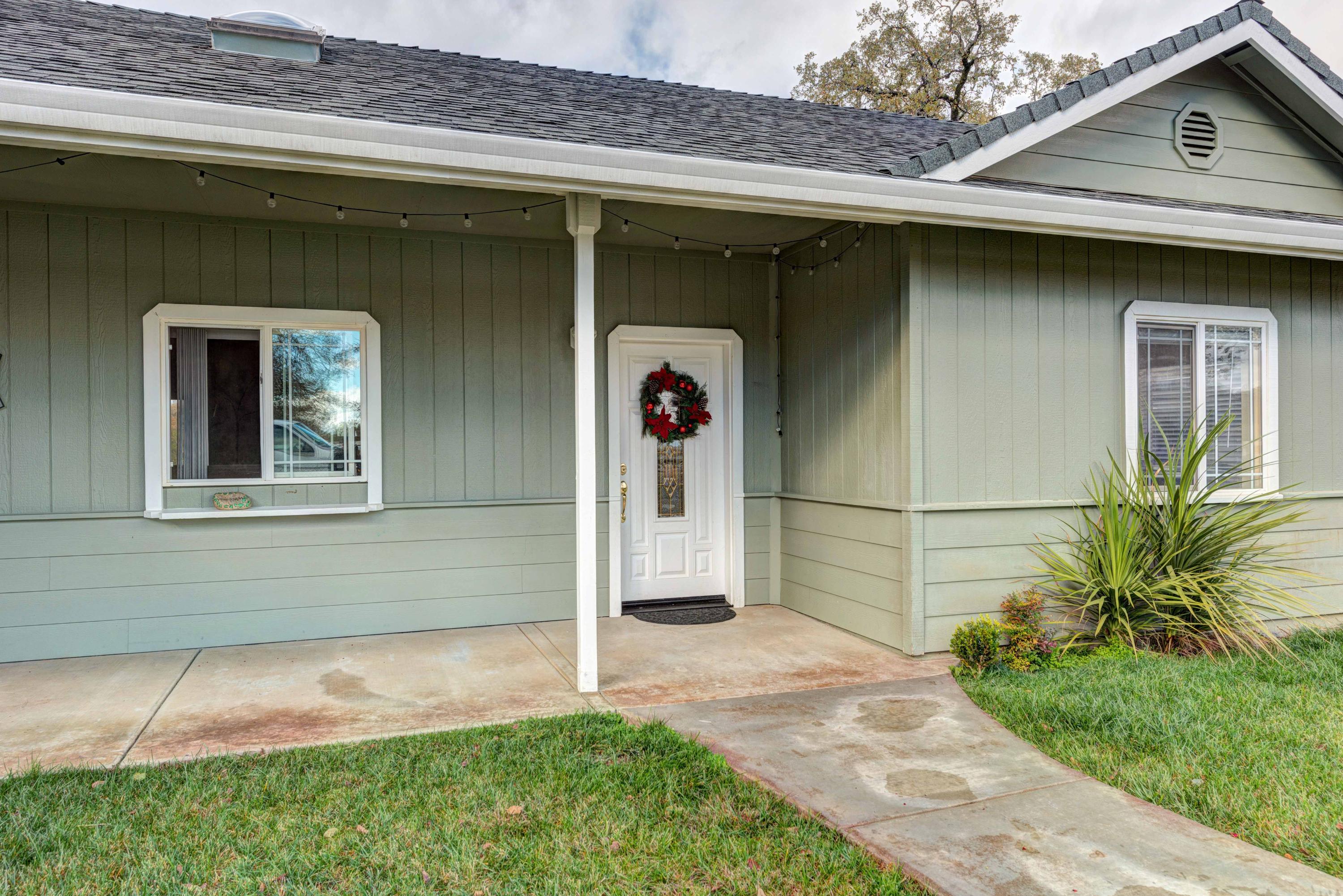 13711 Gas Point Road Igo, CA 96047 - Photo 4 of 29 a front view of a house with garden