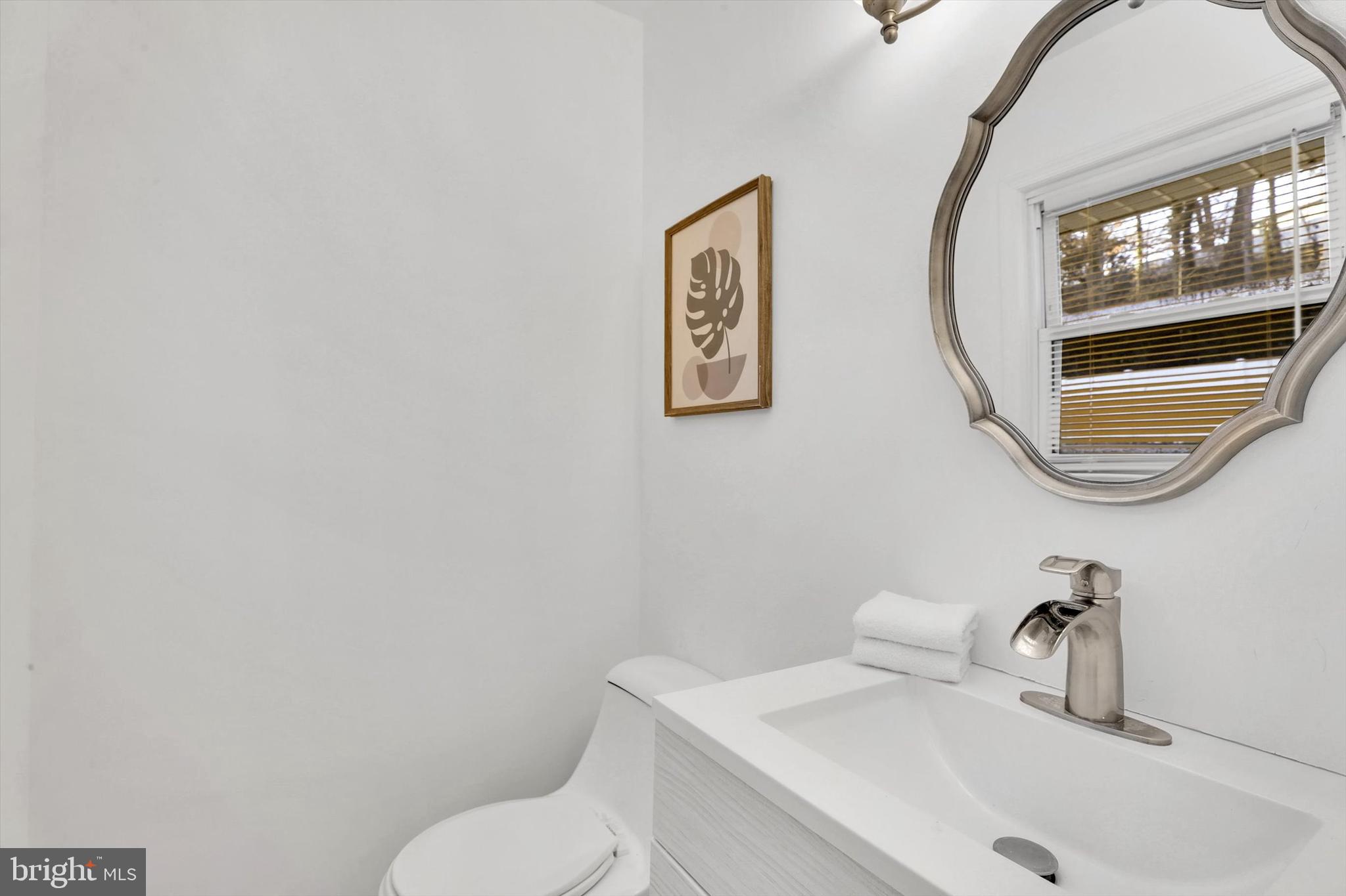 560 Edwards Drive Odenton, MD 21113 - Photo 20 of 39 a bathroom with a toilet and a sink