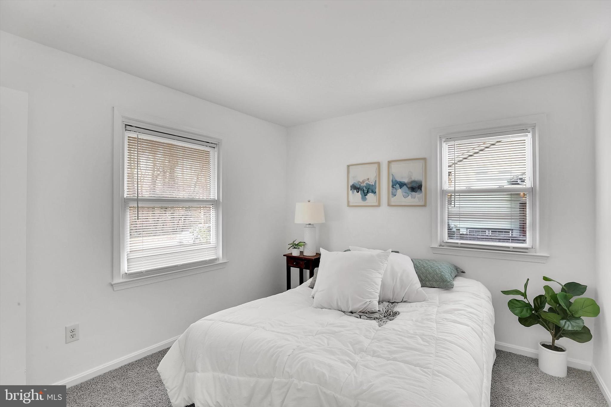 560 Edwards Drive Odenton, MD 21113 - Photo 21 of 39 a bedroom with a bed and a window