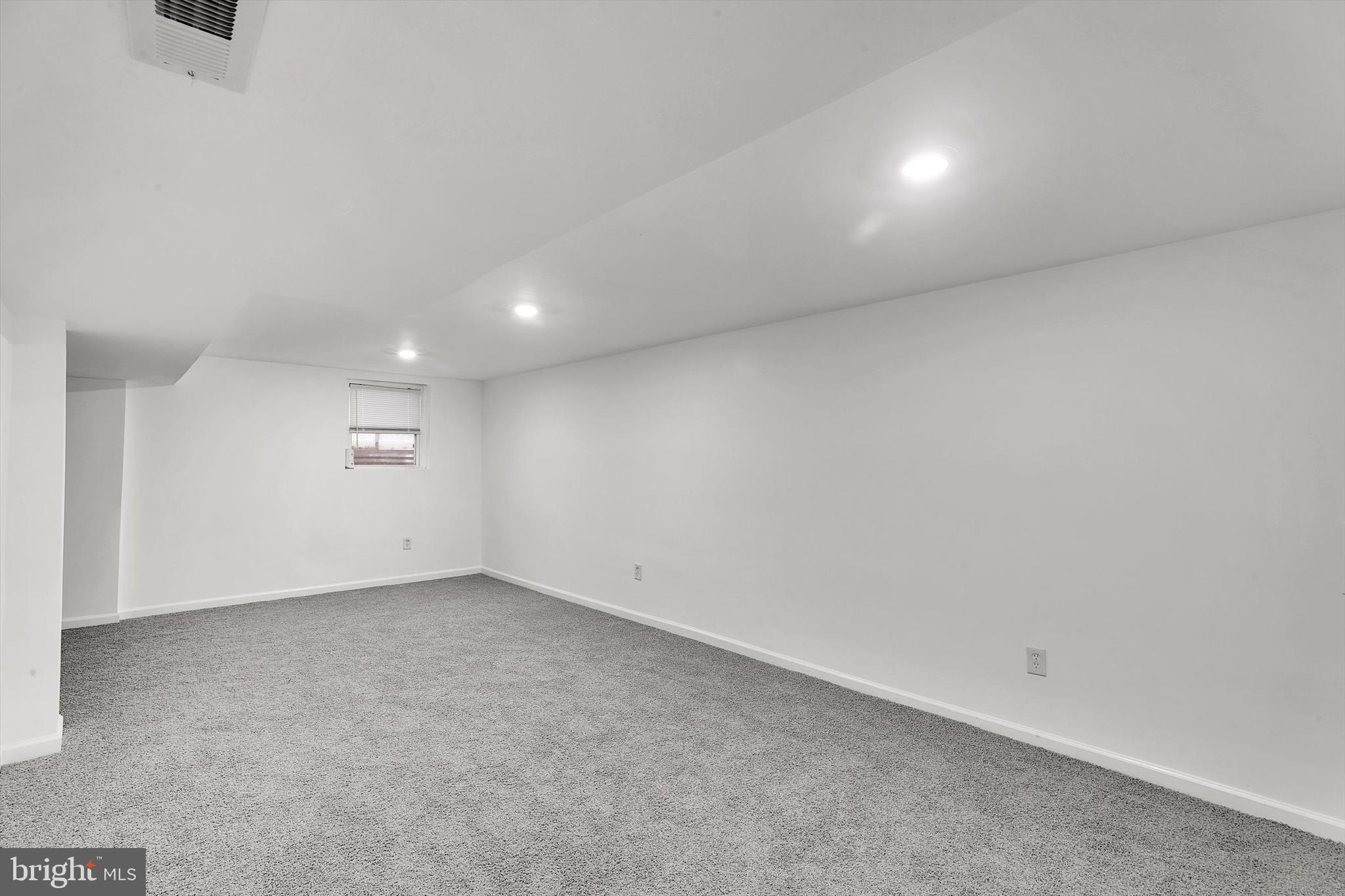 560 Edwards Drive Odenton, MD 21113 - Photo 23 of 39 an empty room with a empty space and windows