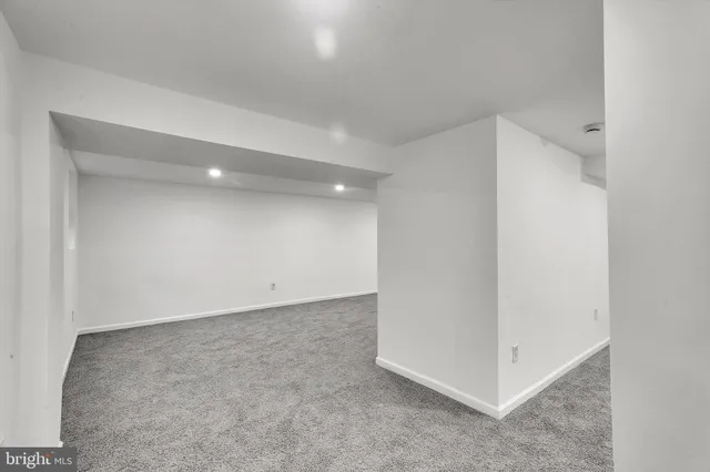 an empty room with a natural light