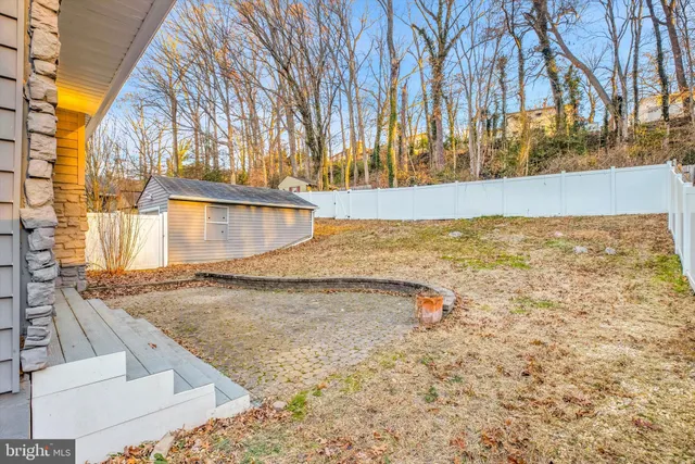 a view of a swimming pool with an outdoor space