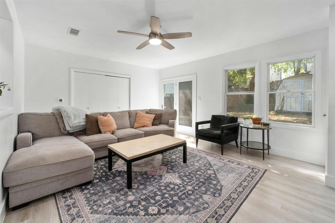 1713 Hether Street Austin, TX 78704 - Photo 1 of 1 a living room with furniture and a large window