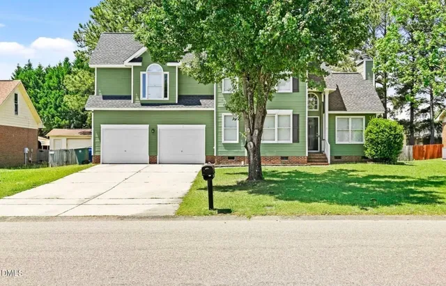 front view of house with a yard