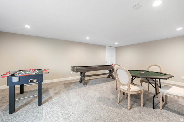 4527 North Seven Bridges Road Eden, UT 84310 - Photo 36 of 65 Recreation room featuring light colored carpet and recessed lighting