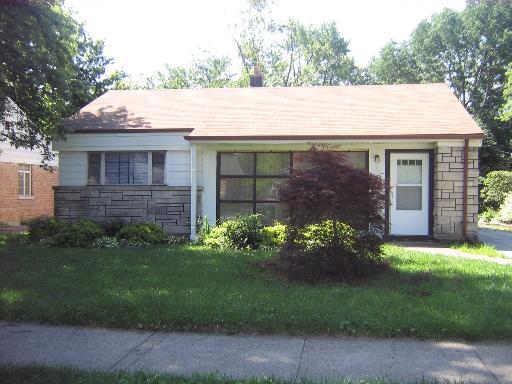 2115 Spruce Road Homewood, IL 60430 - Photo 1 of 1 a small garden covered with tall trees