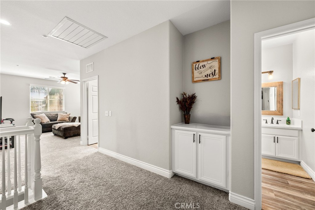 19791 Paso Robles Drive Riverside, CA 92508 - Photo 15 of 29 a view of livingroom with furniture and cabinet
