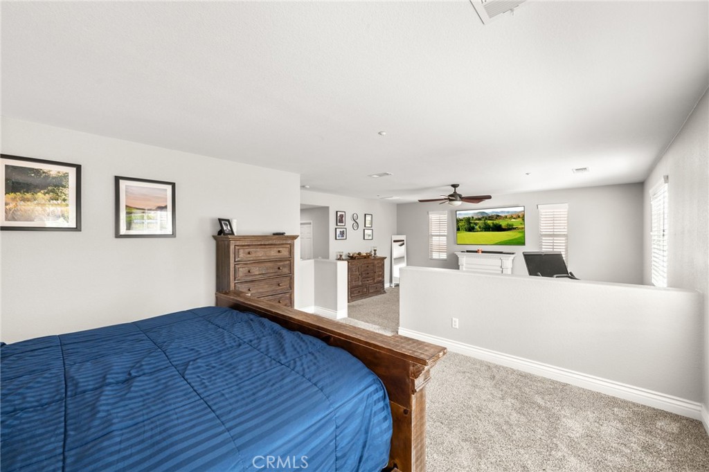 19791 Paso Robles Drive Riverside, CA 92508 - Photo 22 of 29 a view of a kitchen with wooden floor and a sink