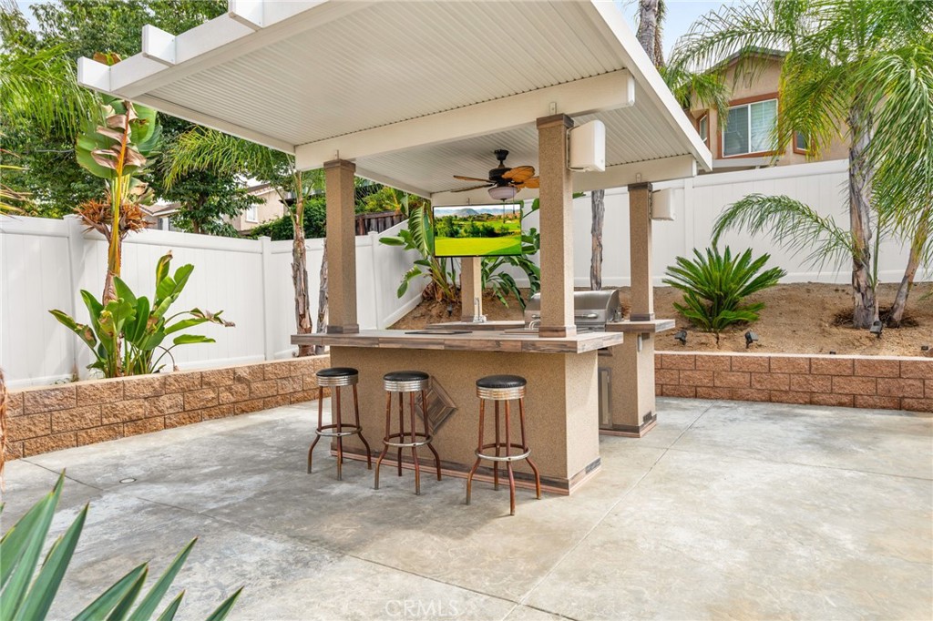 19791 Paso Robles Drive Riverside, CA 92508 - Photo 28 of 29 a view of a chairs and table in the patio