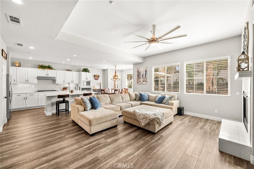 19791 Paso Robles Drive Riverside, CA 92508 - Photo 5 of 29 a living room with furniture and a large window
