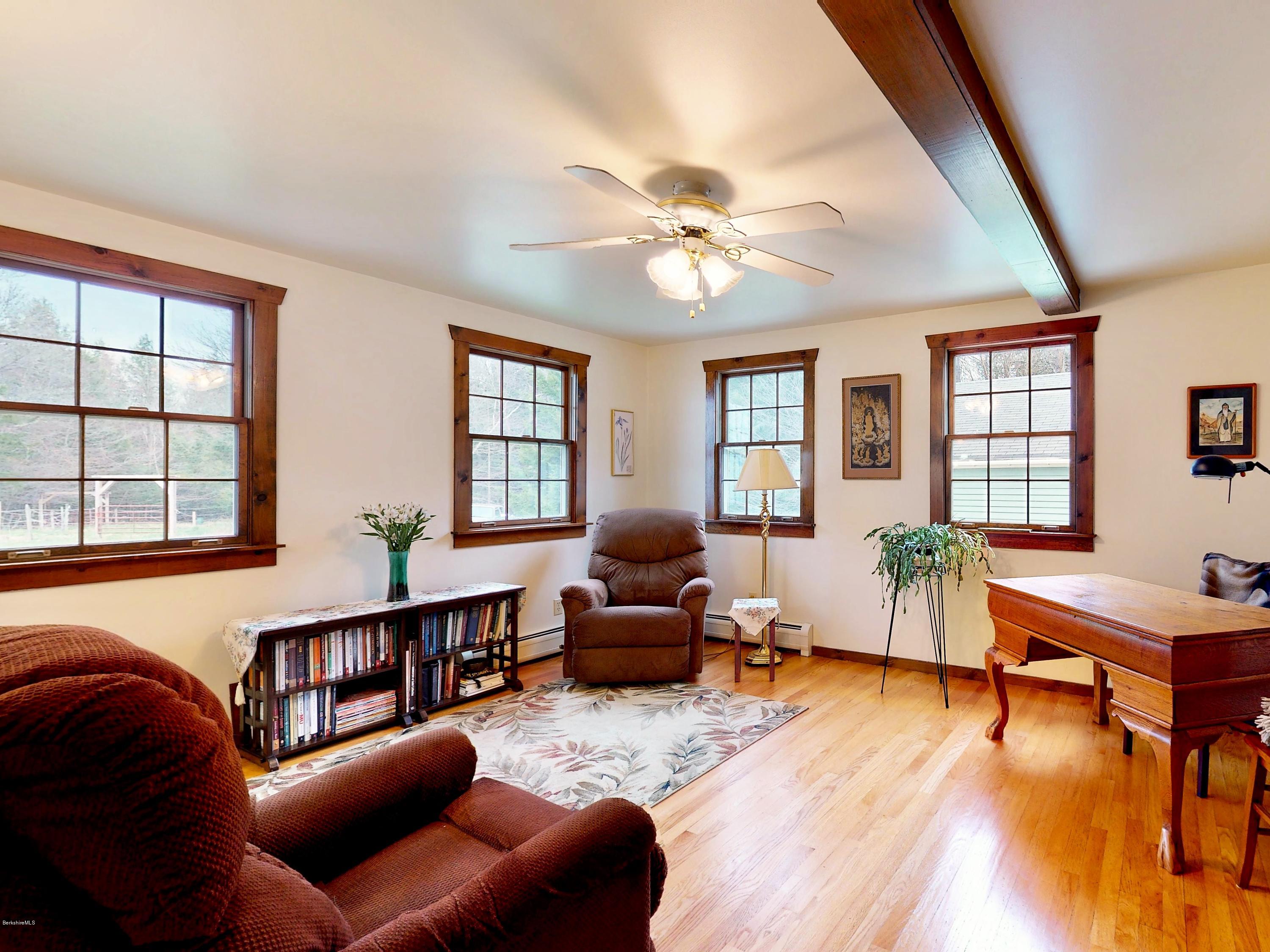 25 Groll Road Heath, MA 01346 - Photo 11 of 23 a living room with furniture and wooden floor