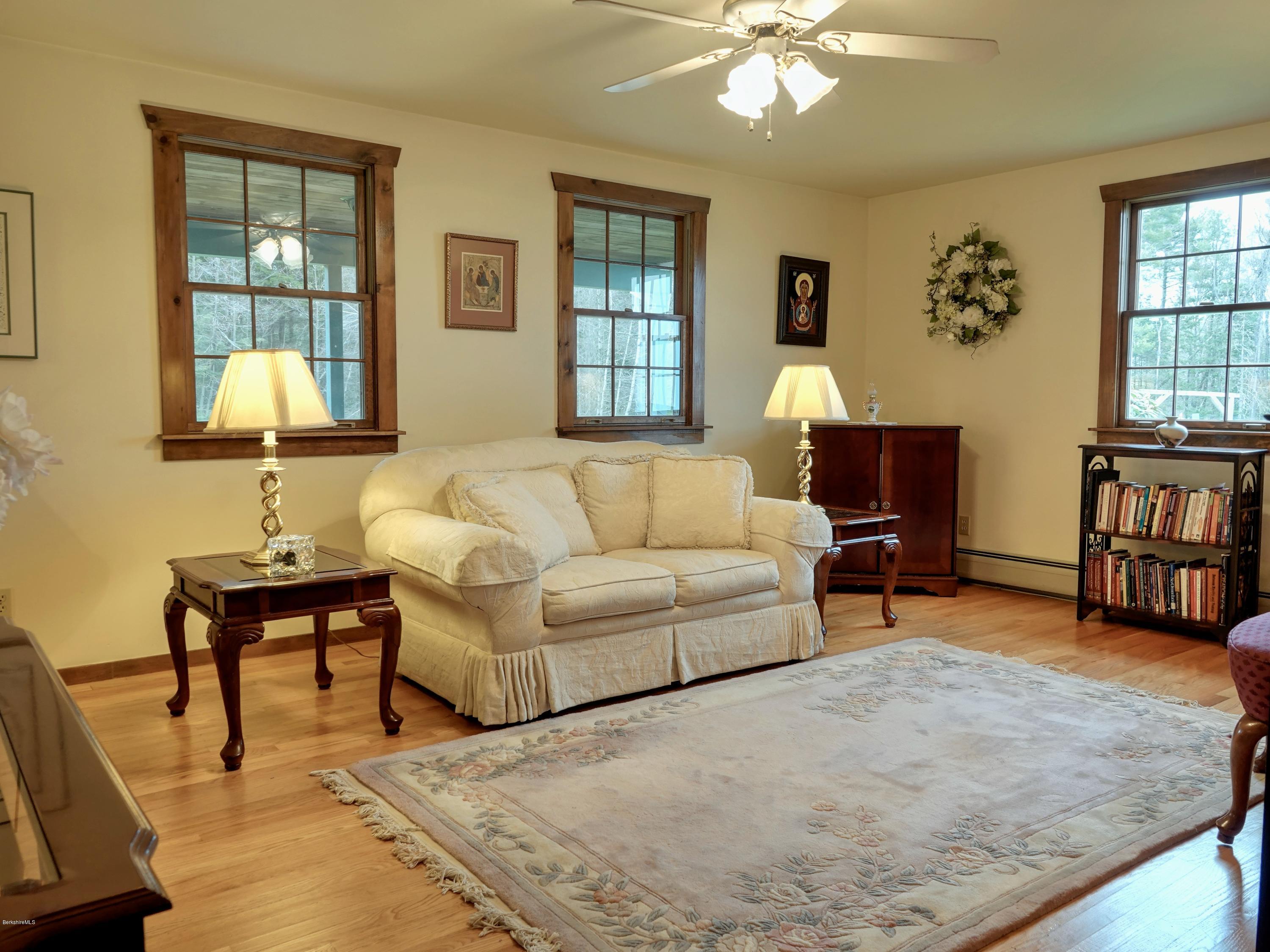 25 Groll Road Heath, MA 01346 - Photo 3 of 23 a living room with furniture and a flat screen tv
