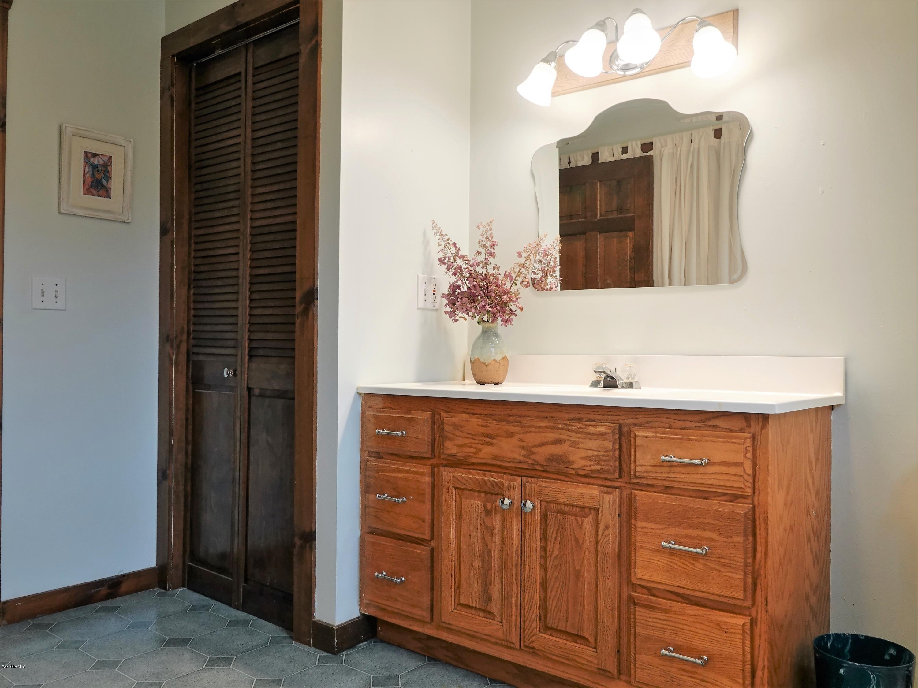 25 Groll Road Heath, MA 01346 - Photo 7 of 23 a bathroom with a sink and a mirror