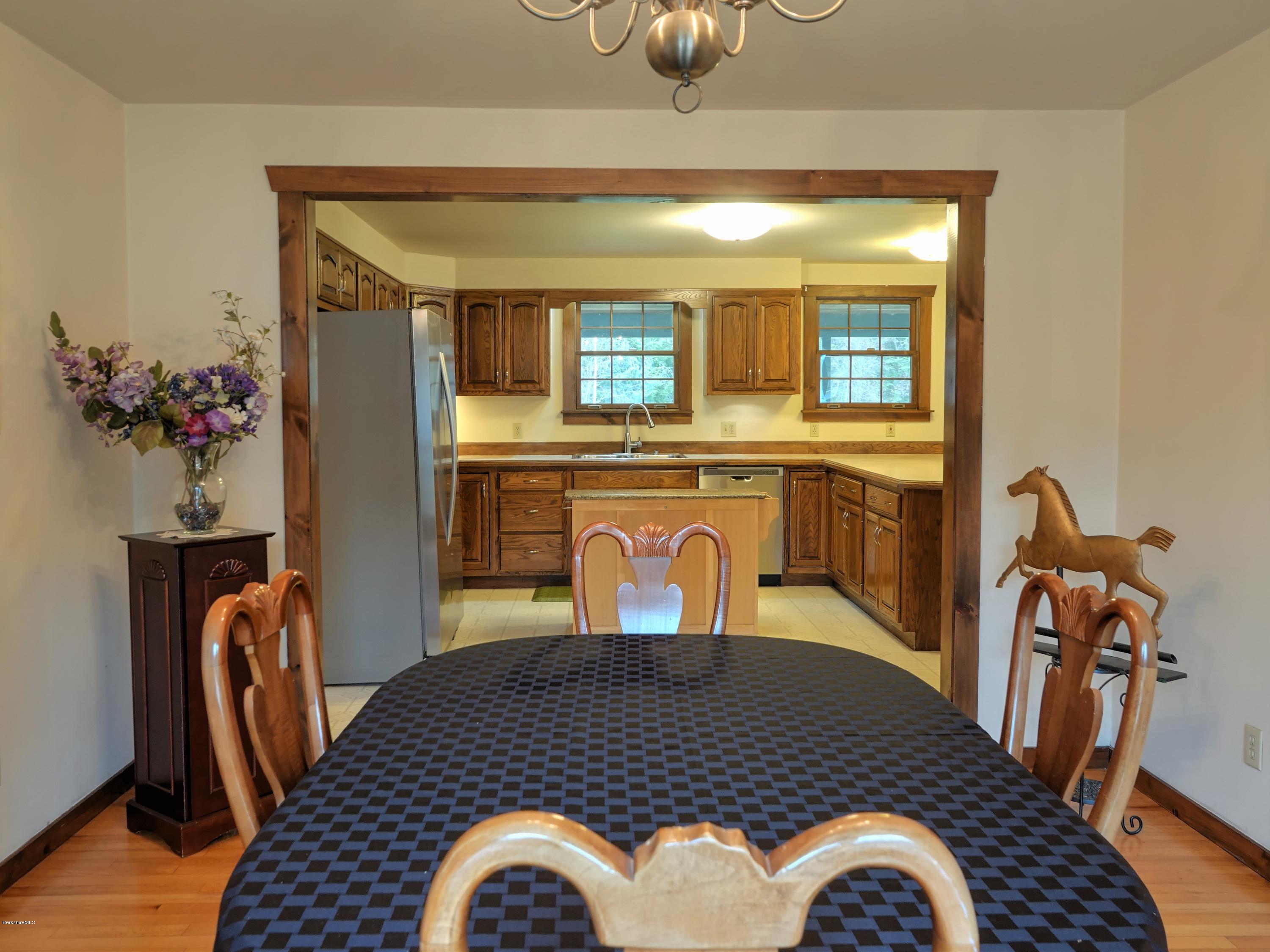 25 Groll Road Heath, MA 01346 - Photo 8 of 23 a view of a dining room with furniture