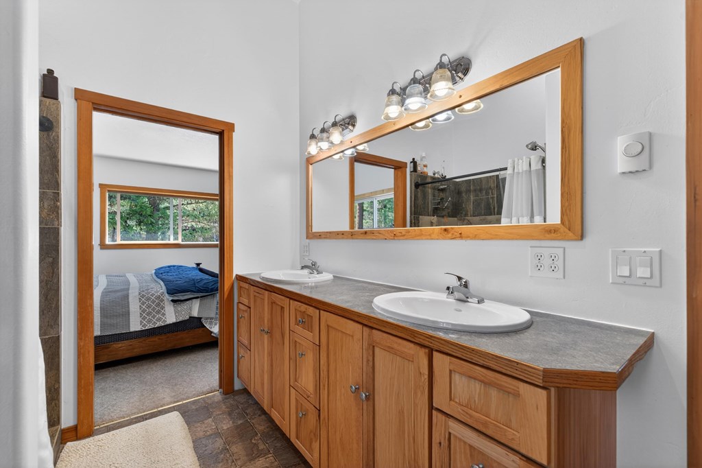 13810 Shadow Ridge Drive McCall, ID 83638 - Photo 12 of 31 Dual vanities in the priary bath