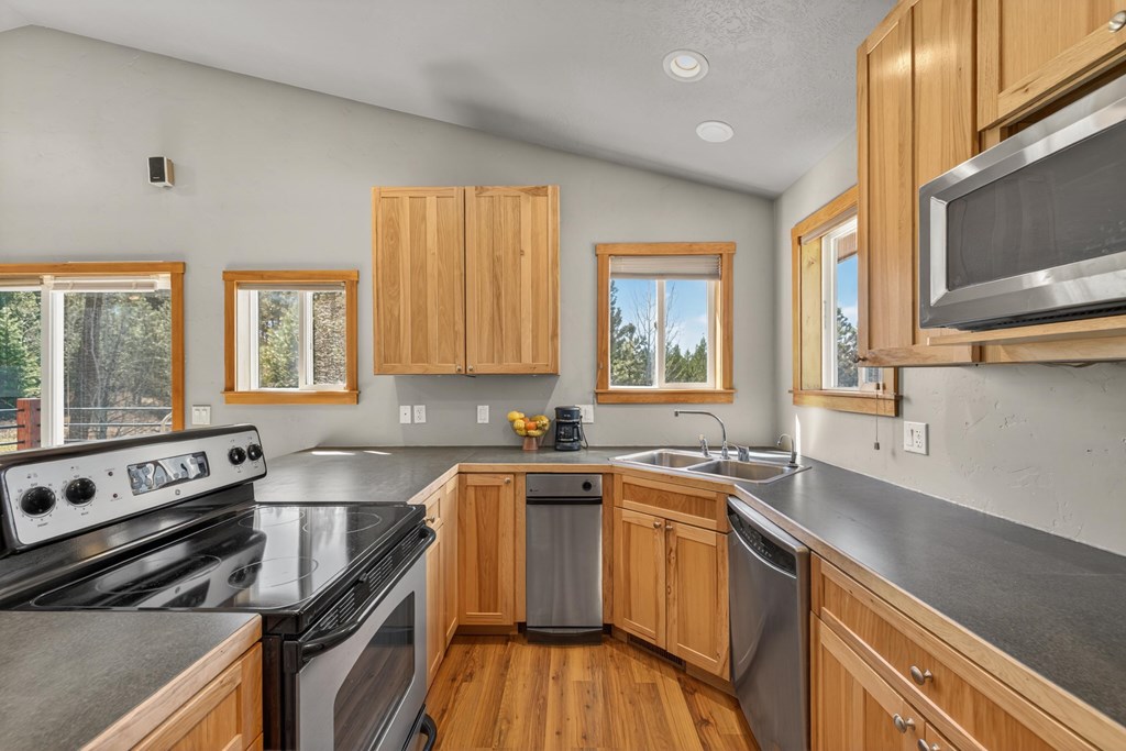 13810 Shadow Ridge Drive McCall, ID 83638 - Photo 8 of 31 Stainless appliances and hickory cabinnets