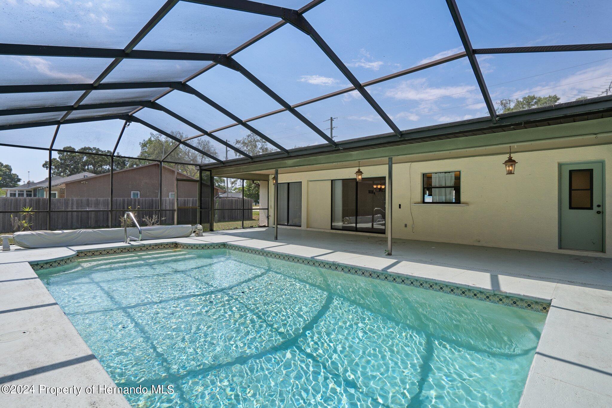 9290 Eldridge Road Spring Hill, FL 34608 - Photo 51 of 55 a view of a backyard