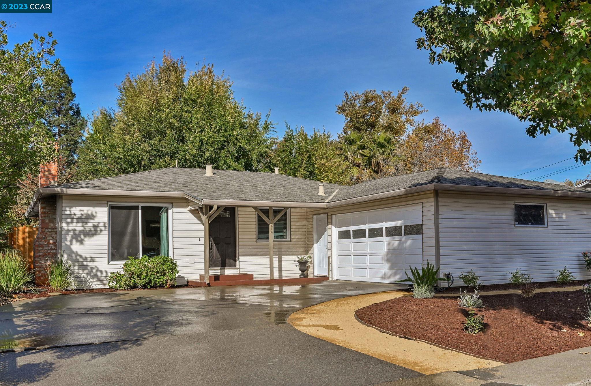 front view of a house with a patio