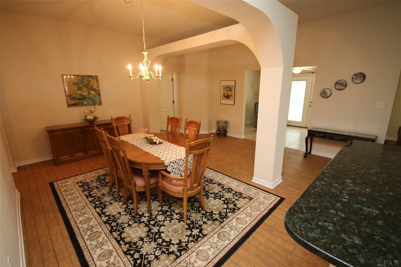 4916 Pineview Ridge Road Pace, FL 32571 - Photo 13 of 50 area from the kitchen. FL room to your right.