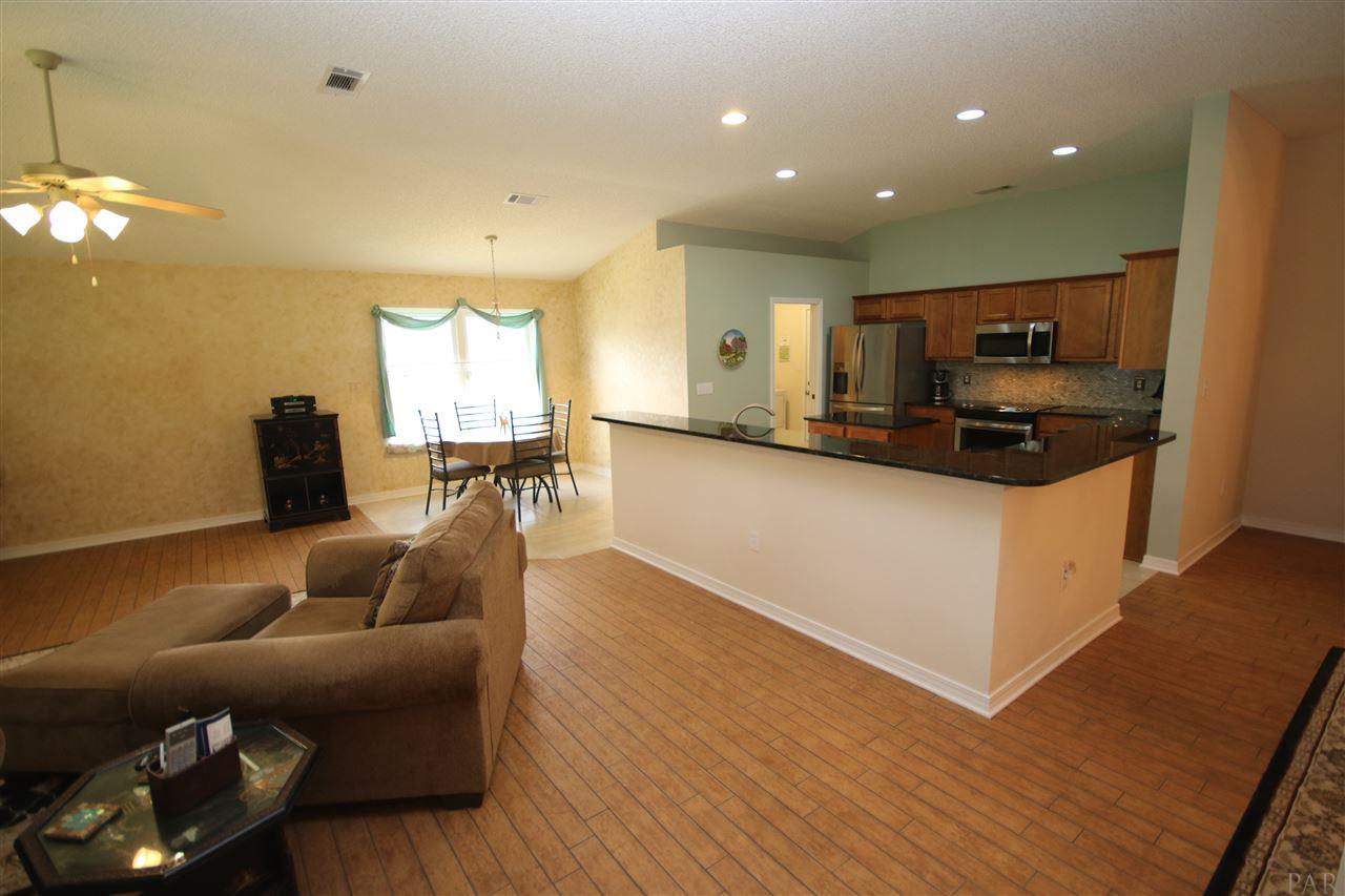 4916 Pineview Ridge Road Pace, FL 32571 - Photo 14 of 50 Homeowners added granite countertops & backsplash.