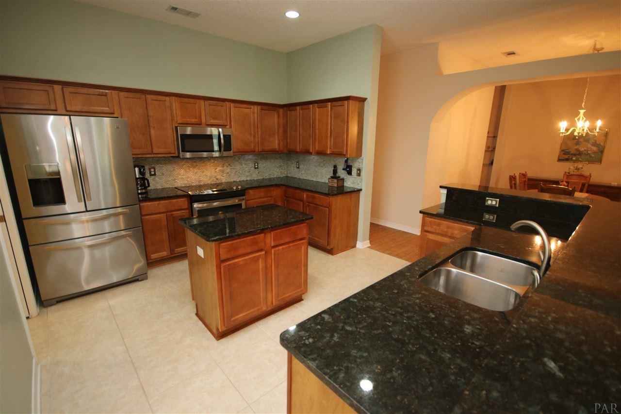 4916 Pineview Ridge Road Pace, FL 32571 - Photo 16 of 50 stainless microwave & beautiful 18" tile flooring!