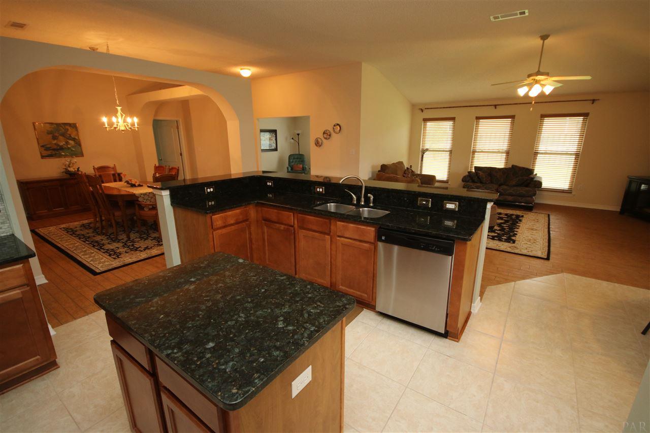 4916 Pineview Ridge Road Pace, FL 32571 - Photo 18 of 50 dishwasher 7/2016. Island w/outlet & storage.