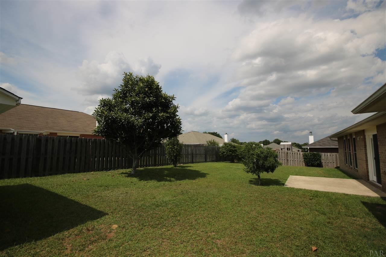 4916 Pineview Ridge Road Pace, FL 32571 - Photo 2 of 50 shadowbox privacy fence.
