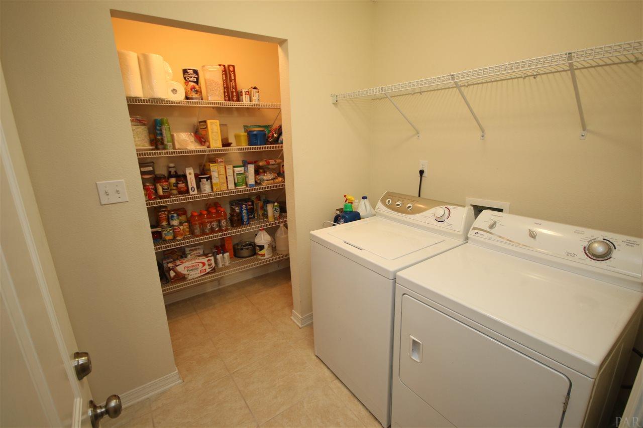 4916 Pineview Ridge Road Pace, FL 32571 - Photo 23 of 50 walk-in pantry.