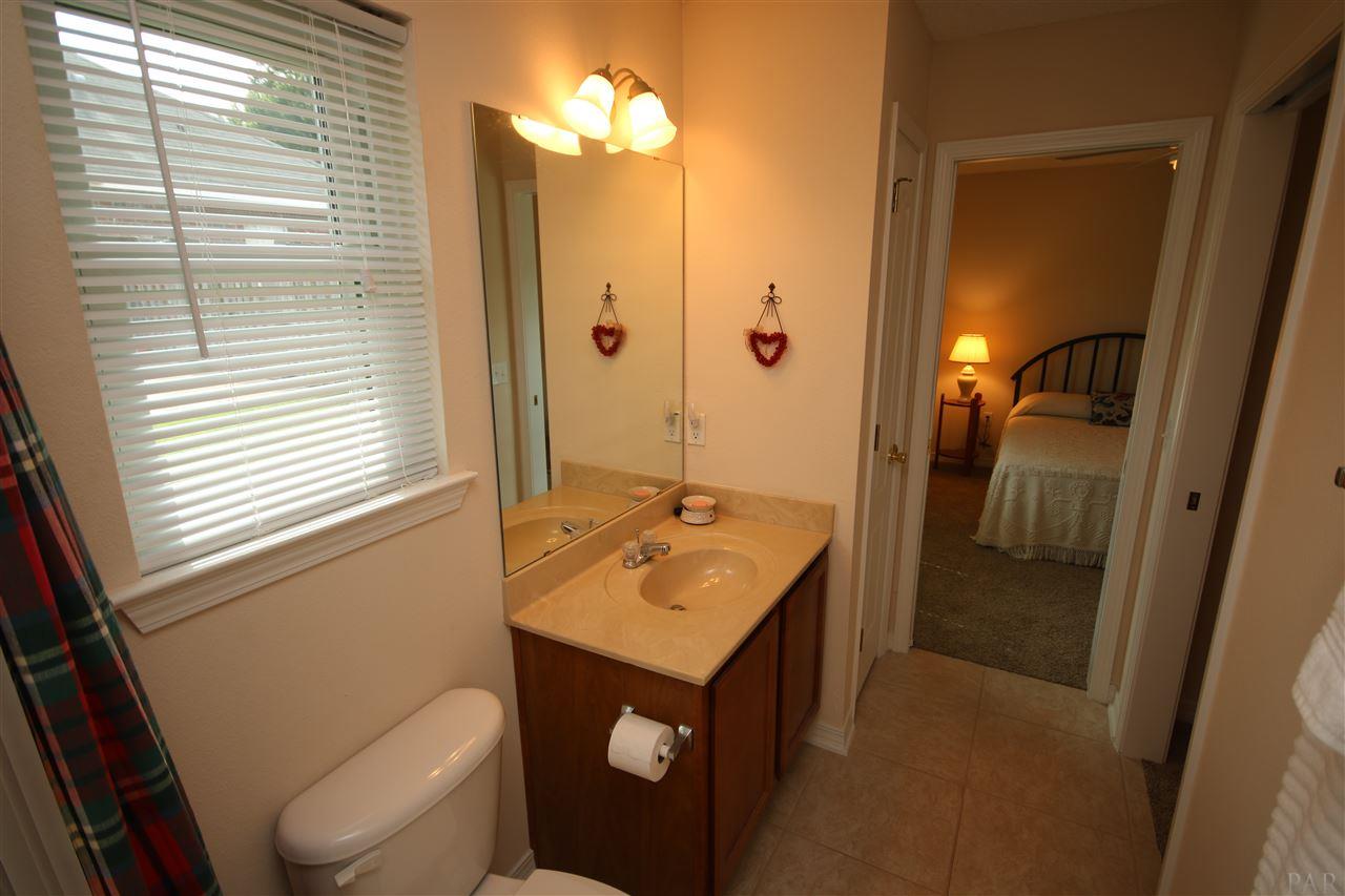 4916 Pineview Ridge Road Pace, FL 32571 - Photo 28 of 50 closet, cultured marble countertop & tile flooring