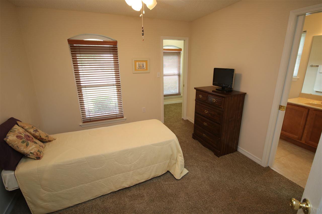 4916 Pineview Ridge Road Pace, FL 32571 - Photo 29 of 50 front of the home w/ walk-in closet w/ a window.