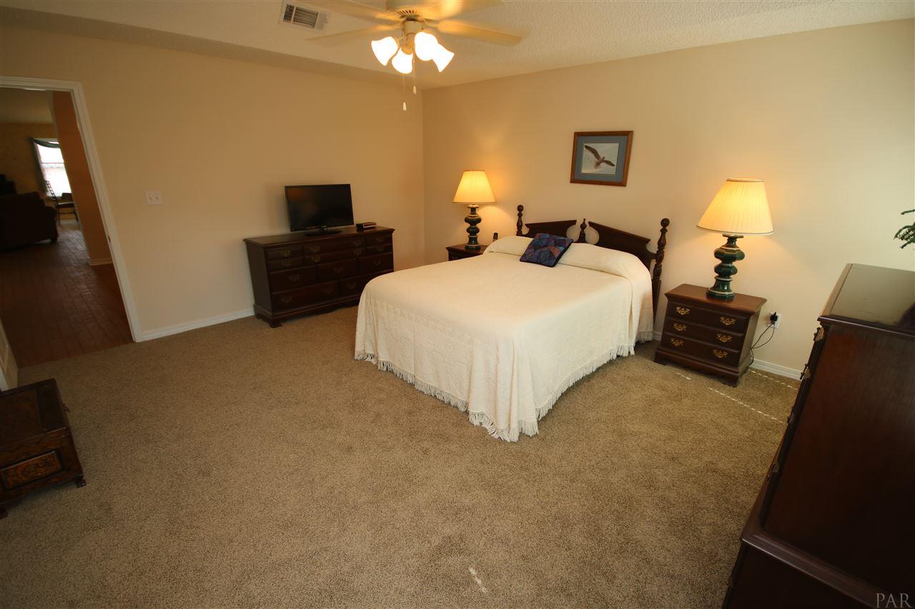 4916 Pineview Ridge Road Pace, FL 32571 - Photo 50 of 50 dining rm, kitchen & great rm. Split floor plan.