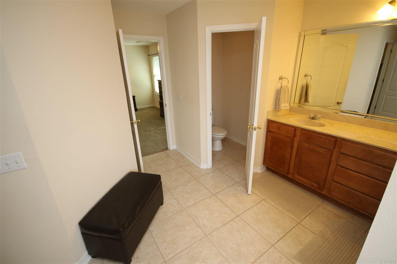 4916 Pineview Ridge Road Pace, FL 32571 - Photo 37 of 50 bedroom left & center, private water closet right.