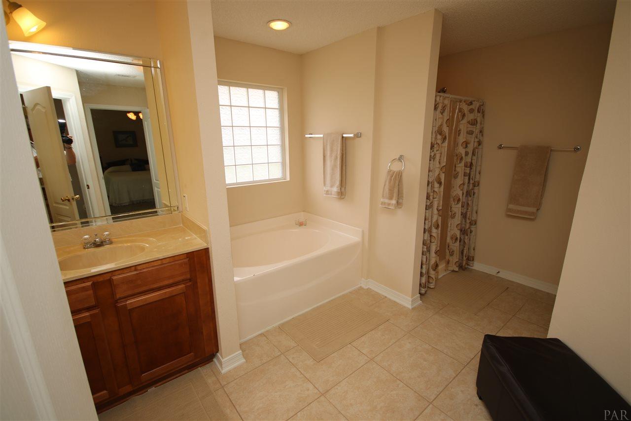 4916 Pineview Ridge Road Pace, FL 32571 - Photo 38 of 50 & large shower with rain shower head.