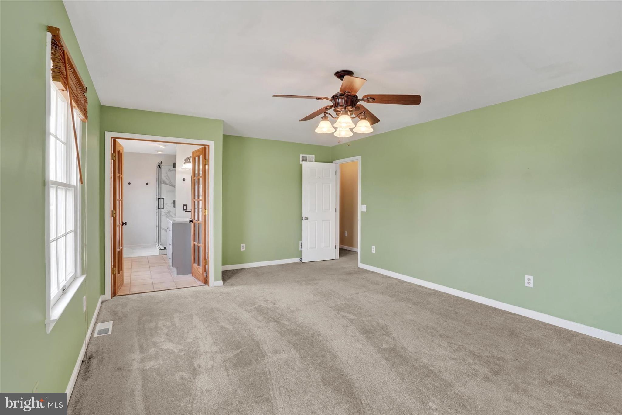 3 Harrison Road New Freedom, PA 17349 - Photo 18 of 28 a view of a room with a chandelier fan and windows