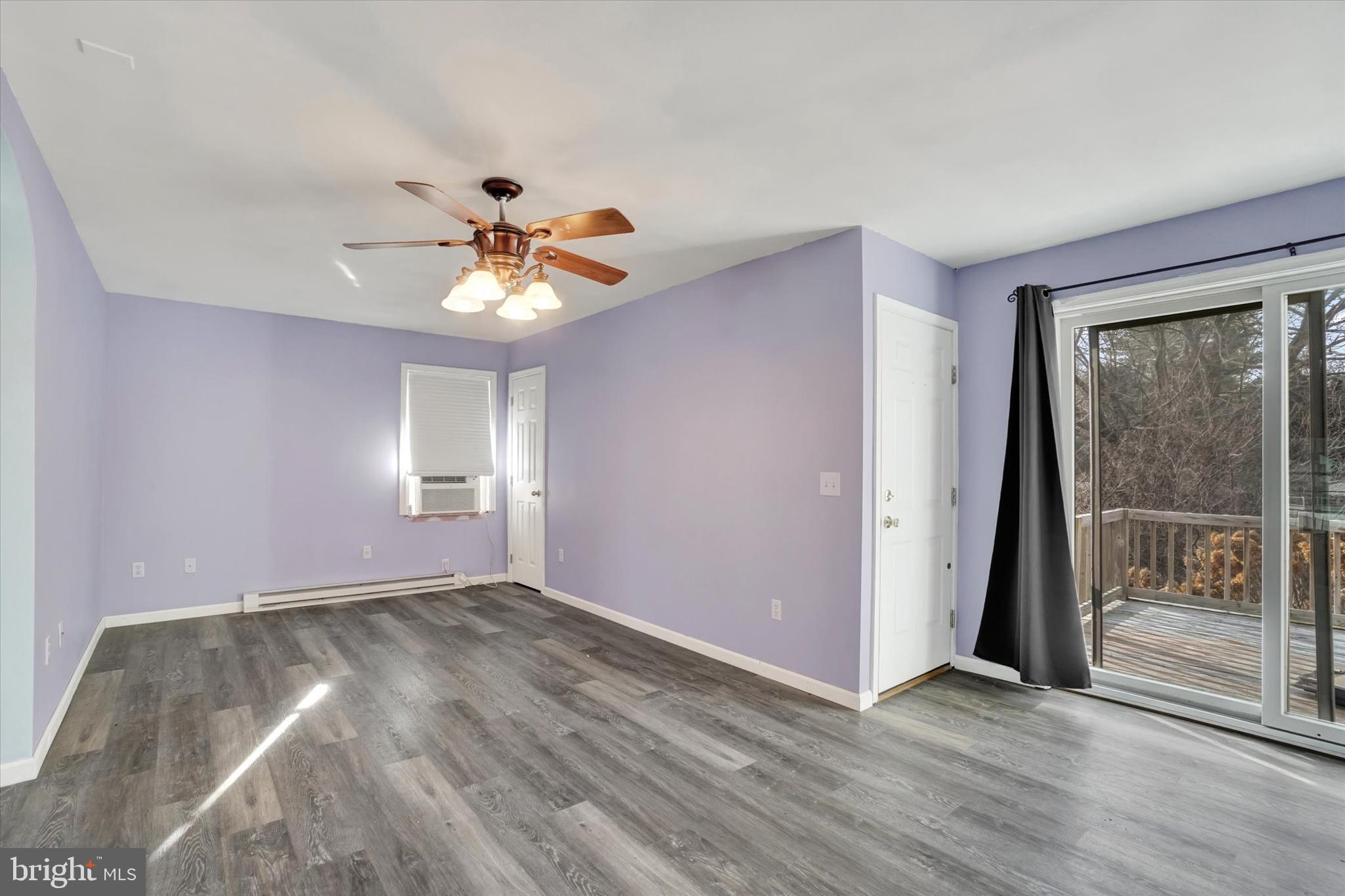 3 Harrison Road New Freedom, PA 17349 - Photo 21 of 28 wooden floor in an empty room with a window