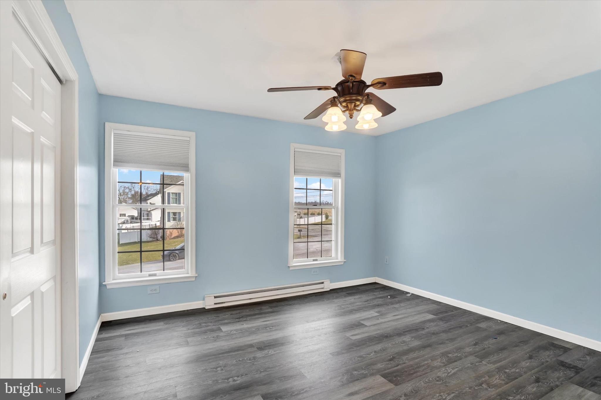 3 Harrison Road New Freedom, PA 17349 - Photo 22 of 28 a view of an empty room with wooden floor and a window