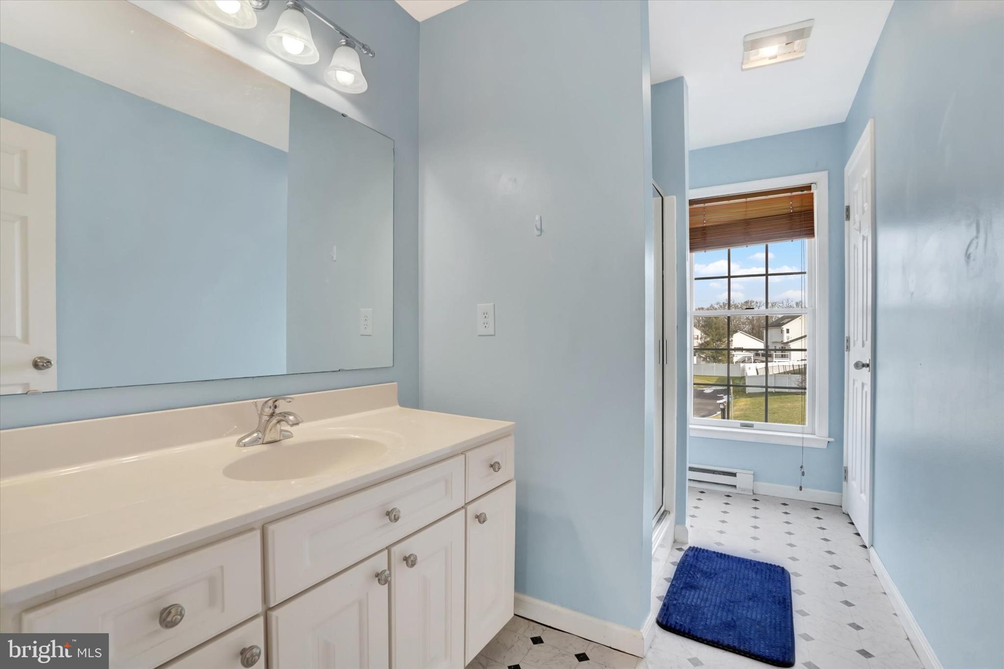 3 Harrison Road New Freedom, PA 17349 - Photo 23 of 28 a en suite bathroom with a sink and a mirror