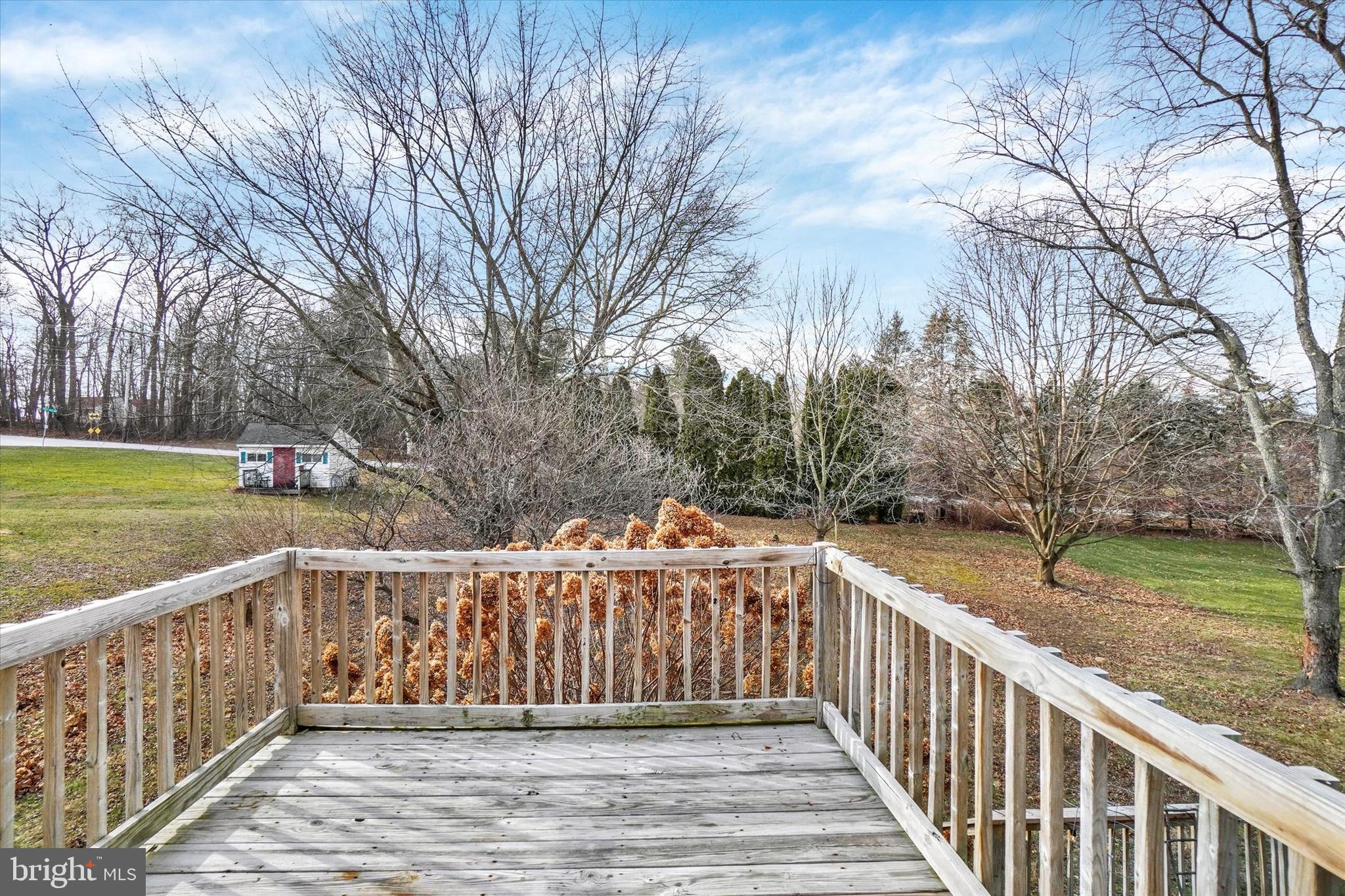 3 Harrison Road New Freedom, PA 17349 - Photo 24 of 28 a view of a wooden deck and a yard with swimming pool